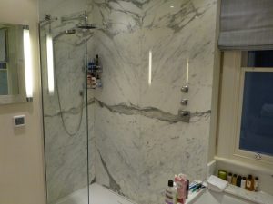 Brands built bookmarked marble ensuite shower bath stone